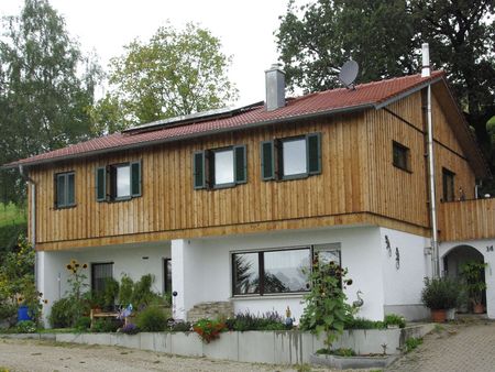 Aufstockung mit Holzfassade nachher