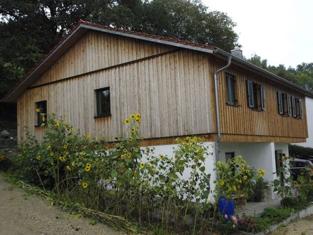 Aufstockung mit Holzfassade